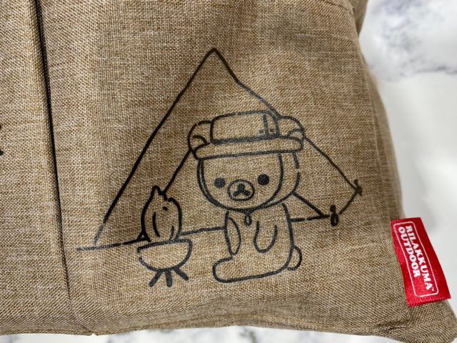 リラックマfeat.KiU撥水BIGピクニックバッグのデザイン