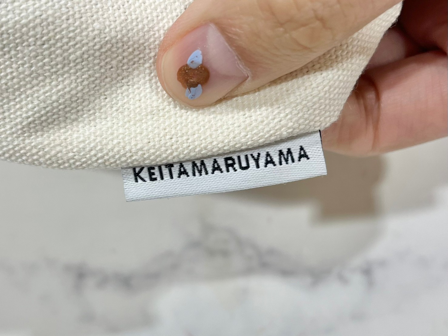 双子パンダトートバッグのロゴタグ画像