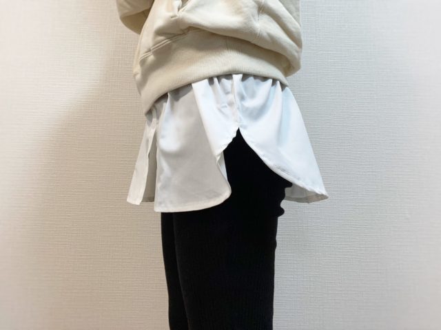 レイヤードコーデの女性