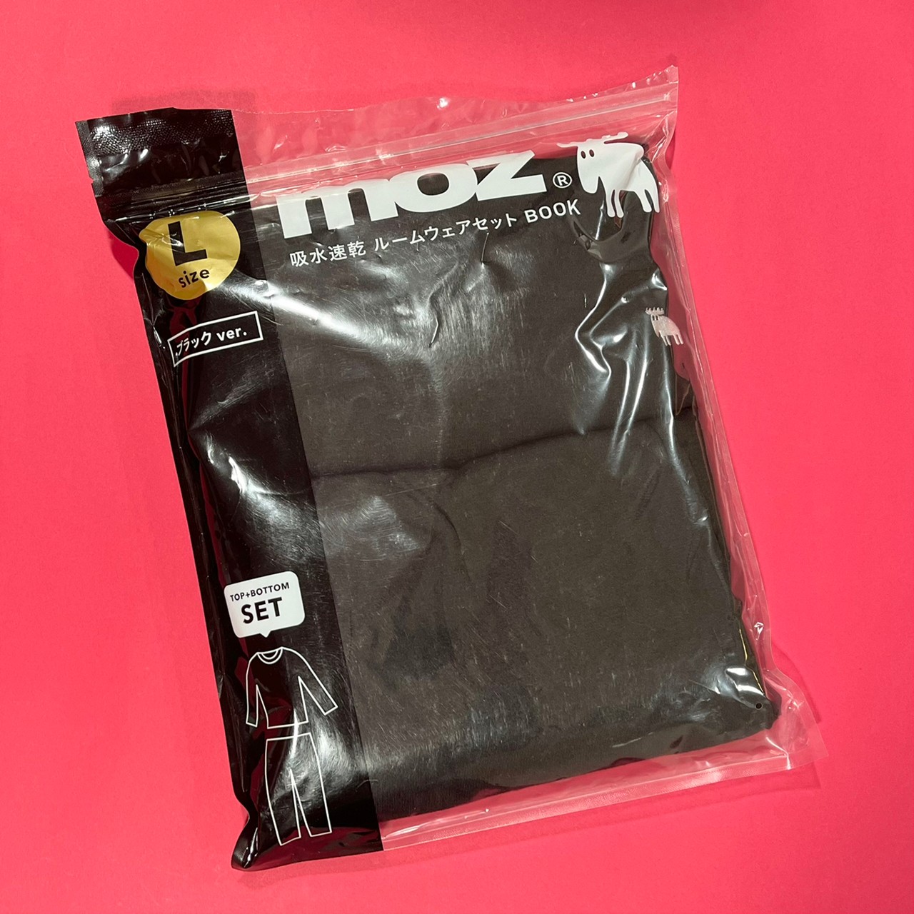moz×ルームウェアセット、ブラックが包装されている画像